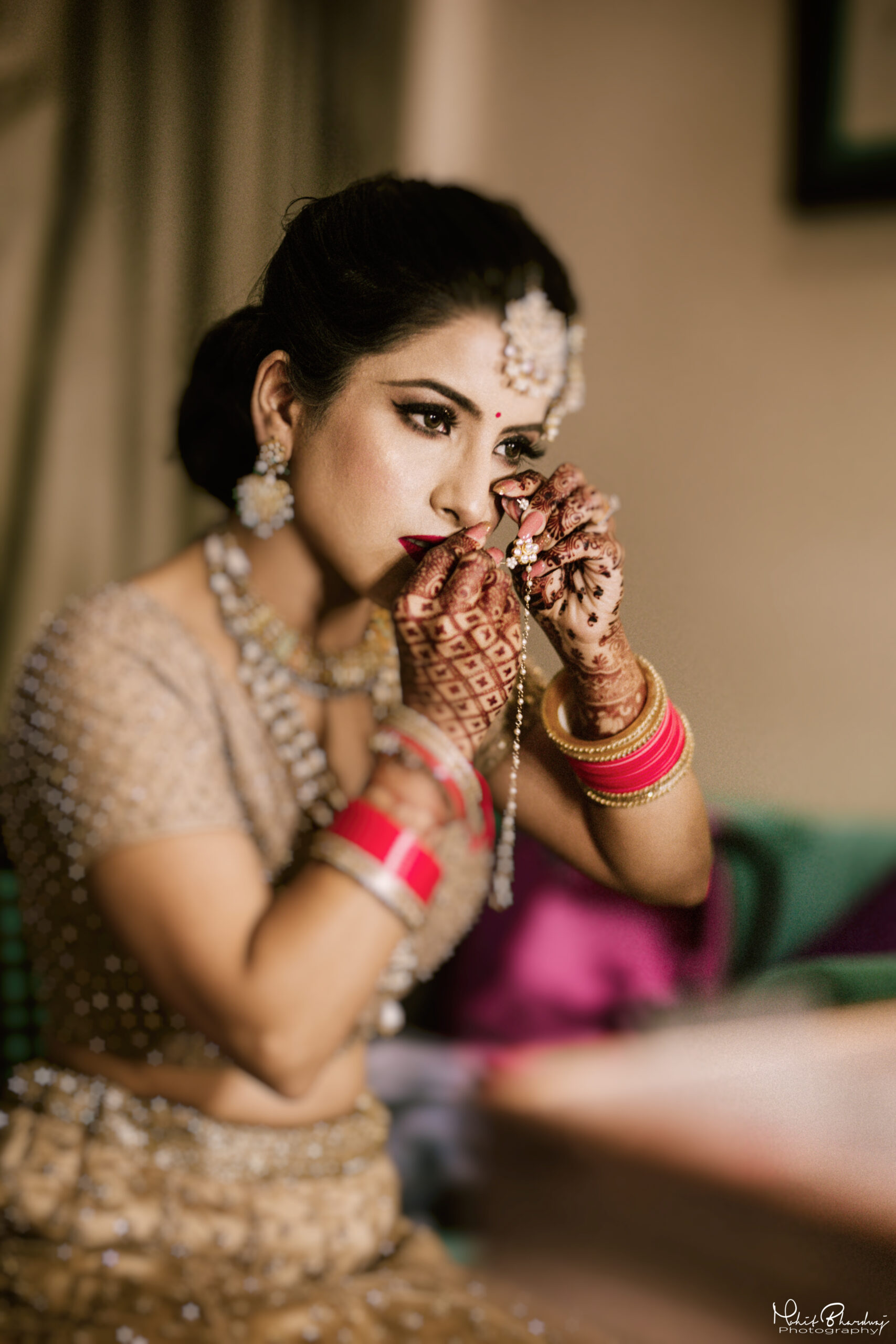 Premium Photo | A bride poses for a photo in her traditional bridal gown.