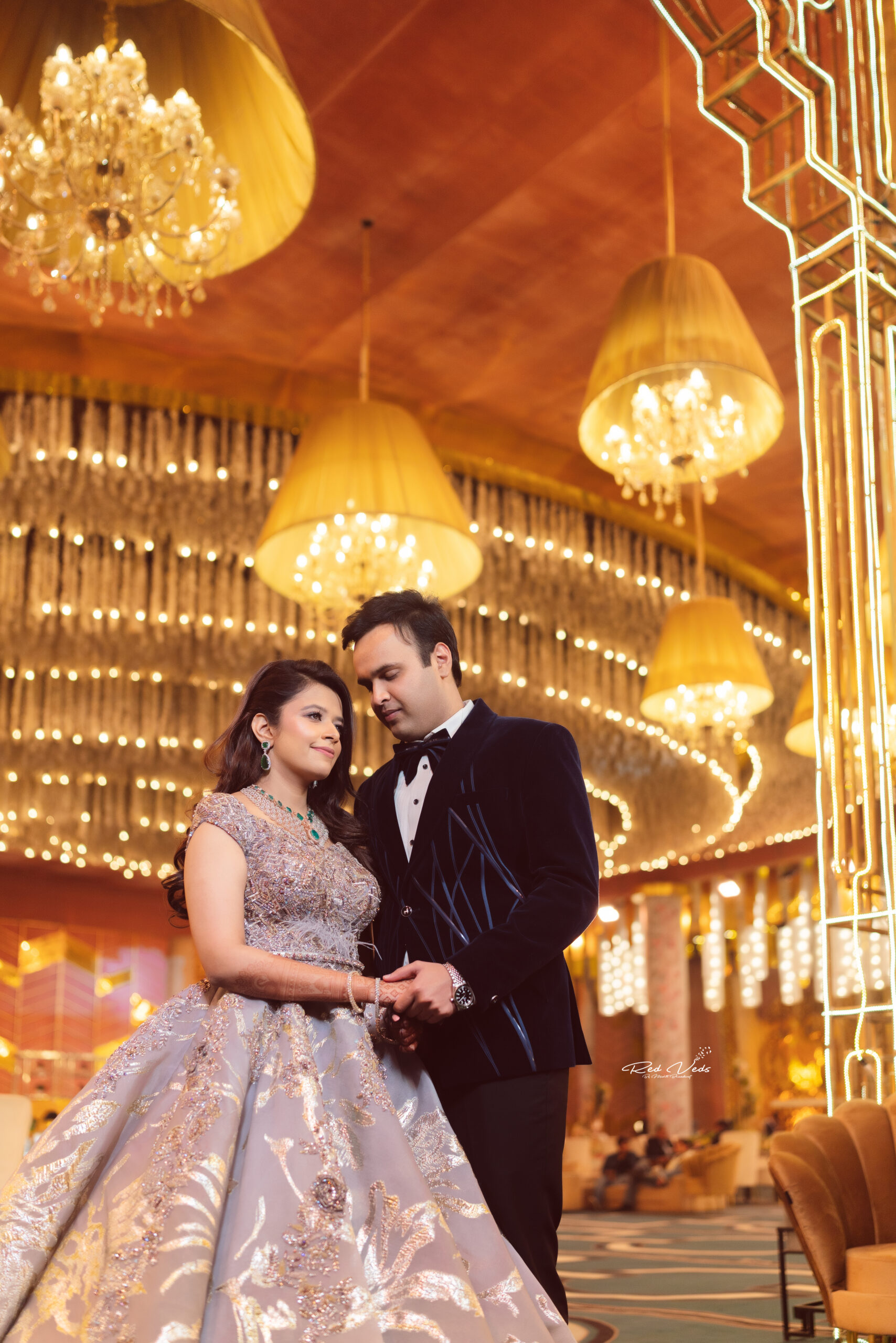 Free Photos - A Joyful Moment Of A Man And A Woman, Both Dressed In  Traditional Wedding Attire, Posing Together For A Photo. The Man Is Wearing  A Suit With A Tie,