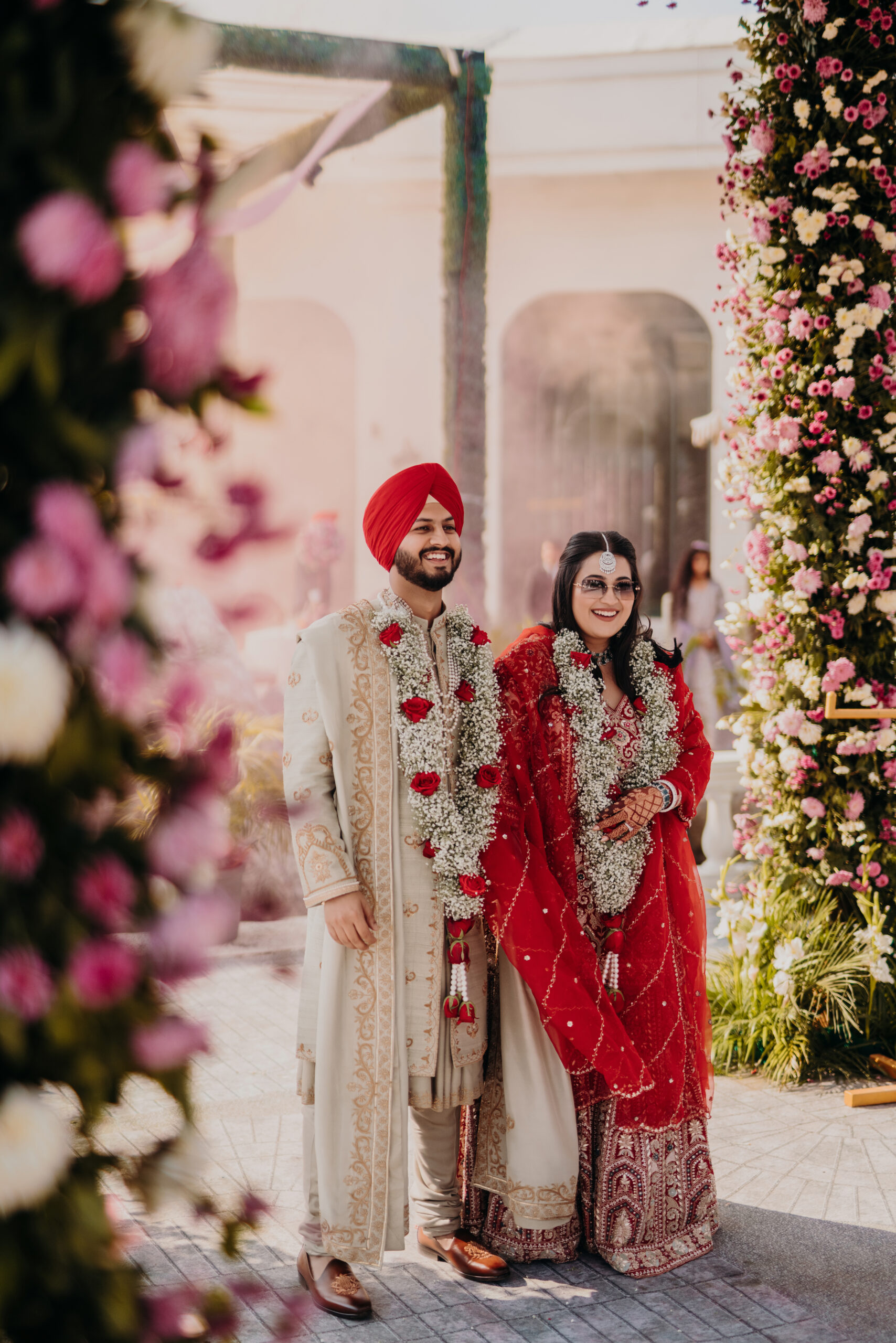 Indian newlywed couple posing Stock Photo - Alamy